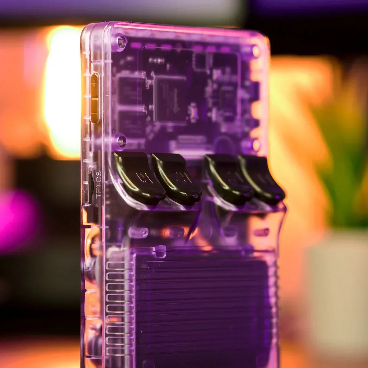 Back of the Elinose retro handheld game console in Cosmic Purple crystal shell